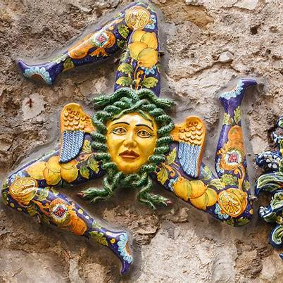 Trinacria Sicily symbol – Medusa Gorgon head with three legs representing Sicily’s three capes